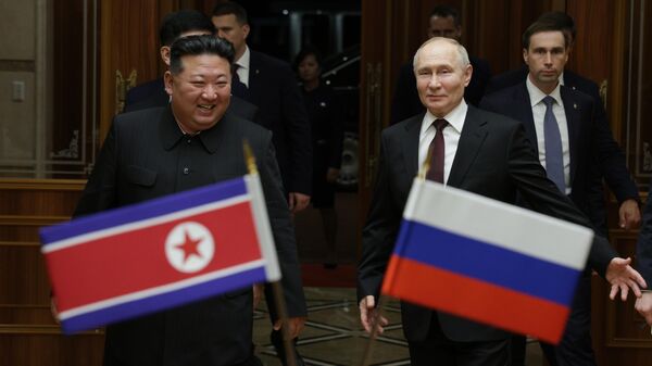 Лидер КНДР Ким Чен Ын и президент России Владимир Путин. Архивное фото - Sputnik Кыргызстан